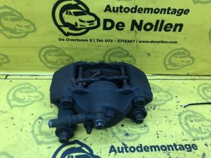 Used Front brake calliper, left Mazda Demio (DW) 1.3 16V Price € 40,00 Margin scheme offered by de Nollen autorecycling