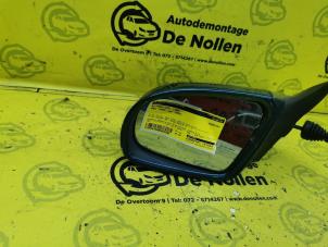 Used Wing mirror, left Opel Corsa B (73/78/79) 1.2i 16V Price € 25,00 Margin scheme offered by de Nollen autorecycling