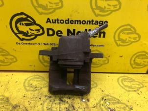 Used Front brake calliper, right Renault Twingo II (CN) 1.2 Price € 30,00 Margin scheme offered by de Nollen autorecycling