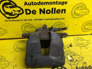 Used Front brake calliper, left Opel Corsa D 1.2 16V Price € 40,00 Margin scheme offered by de Nollen autorecycling