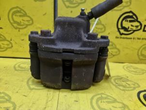 Used Front brake calliper, left Renault Twingo II (CN) 1.2 16V Price € 40,00 Margin scheme offered by de Nollen autorecycling