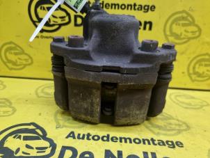 Used Front brake calliper, right Renault Twingo II (CN) 1.2 16V Price € 40,00 Margin scheme offered by de Nollen autorecycling