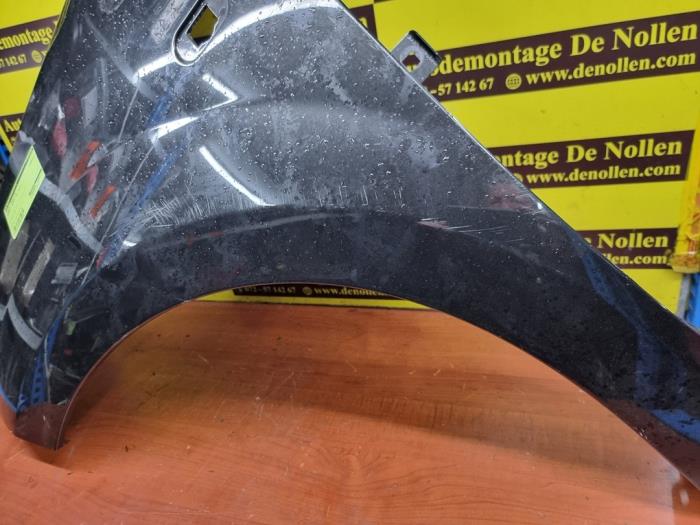 Front wing, left from a Renault Twingo II (CN) 1.2 16V 2011
