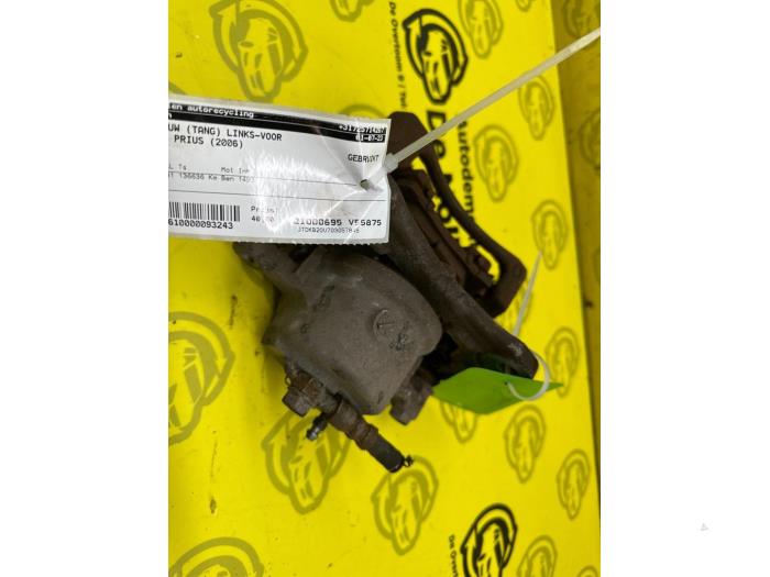 Front brake calliper, left from a Toyota Prius (NHW20) 1.5 16V 2006