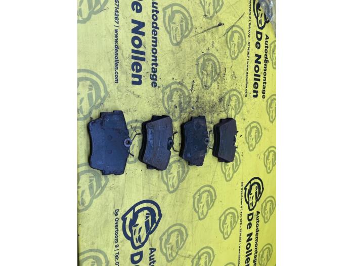 Rear brake pad from a Renault Trafic New (FL) 1.9 dCi 100 16V 2003