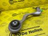 Front lower wishbone, left from a BMW 1 serie (E88) 120i 16V 2010