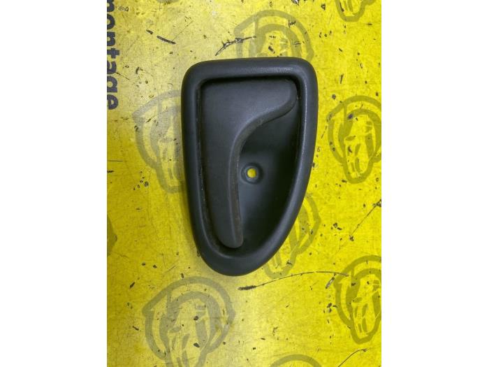 Door handle 2-door, left from a Opel Vivaro 1.9 DI 2001