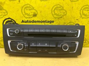 Used Heater control panel BMW 1 serie (F21) 116i 1.6 16V Price € 75,00 Margin scheme offered by de Nollen autorecycling