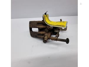 Used Rear brake calliper, left Nissan Almera (N16) 1.8 16V Price € 50,00 Margin scheme offered by de Nollen autorecycling