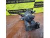 Rear brake calliper, right from a Opel Astra H SW (L35) 1.6 16V Twinport 2008