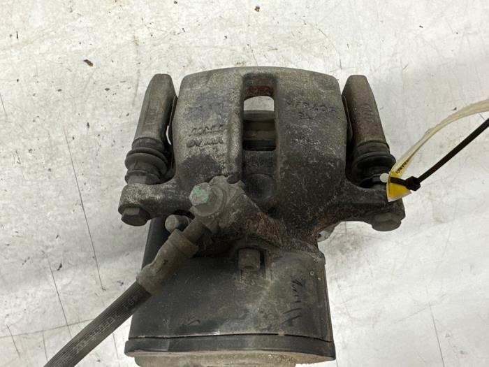 Rear brake calliper, left from a Audi Q3 (8UB/8UG) 2.0 16V TFSI 170 Quattro 2012
