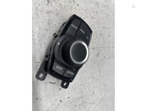 Usagé Bouton I-drive BMW 1 serie (F20) 116i 1.6 16V Prix € 49,99 Règlement à la marge proposé par de Nollen autorecycling