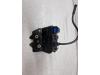 Boot lid lock mechanism from a Ford Mondeo III 1.8 16V 2001