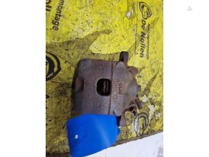Used Front brake calliper, left Daihatsu Cuore (L251/271/276) 1.0 12V DVVT Price € 45,00 Margin scheme offered by de Nollen autorecycling