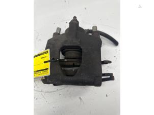 Used Rear brake calliper, right Chrysler Voyager/Grand Voyager (RG) 2.4 16V Price € 50,00 Margin scheme offered by de Nollen autorecycling