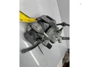 Used Front brake calliper, left Renault Twingo III (AH) ZE R80 Price € 75,00 Margin scheme offered by de Nollen autorecycling
