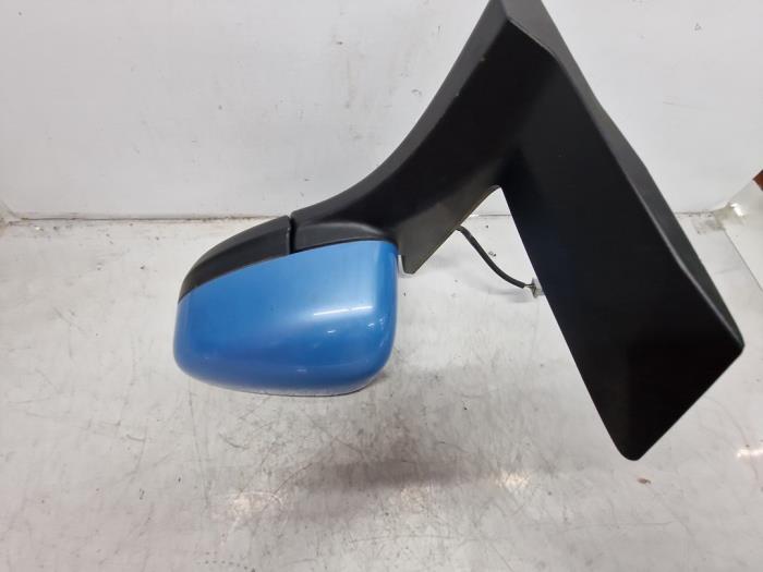 Wing mirror, left from a Ford Transit Courier 1.5 TDCi 75 2014