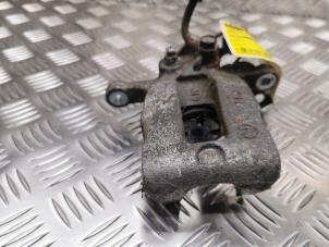 Used Rear brake calliper, left Ssang Yong Tivoli 1.6 e-XDi 16V 2WD Price on request offered by de Nollen autorecycling