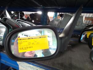 Used Wing mirror, left Renault Clio (B/C57/357/557/577) 1.1i RL,RN Price € 20,00 Margin scheme offered by de Nollen autorecycling