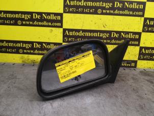 Used Wing mirror, left Mitsubishi Colt (CA/CC) 1.3 i GL,EL 12V Price € 25,00 Margin scheme offered by de Nollen autorecycling
