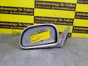 Used Wing mirror, left Mitsubishi Colt (CA/CC) 1.3 i GL,EL 12V Price € 15,00 Margin scheme offered by de Nollen autorecycling