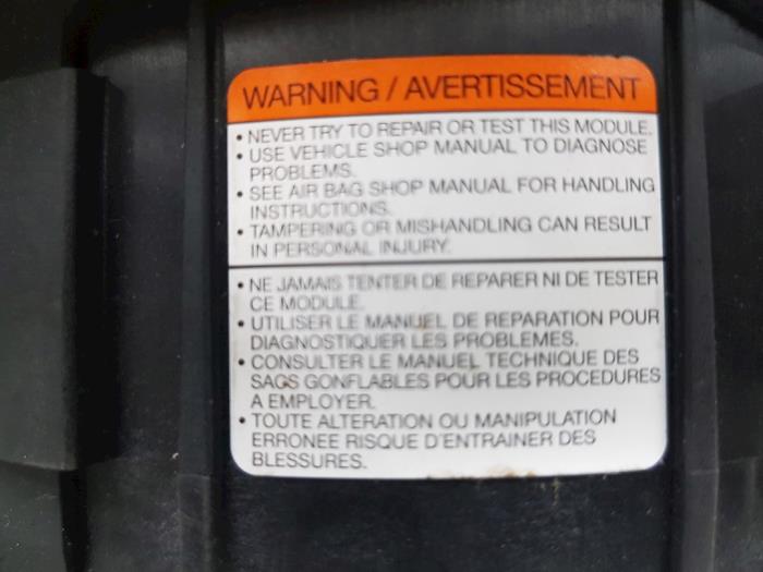 Airbag gauche (volant) d'un Ford Fiesta 6 (JA8) 1.0 EcoBoost 12V 100 2015