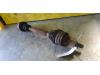 Front drive shaft, left from a Renault Megane Scenic 2001