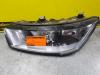 Headlight, left from a Audi A1 2011