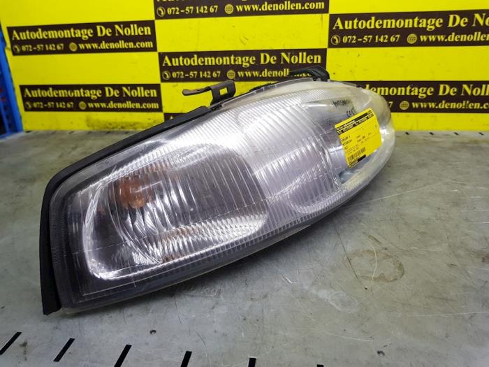 Headlight, right from a Mitsubishi Colt 1999