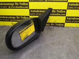 Used Wing mirror, left Kia Shuma Price on request offered by de Nollen autorecycling