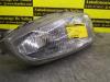 Headlight, left from a Mitsubishi Colt 1997