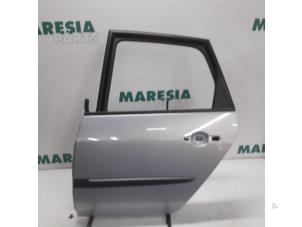 Używane Drzwi lewe tylne wersja 4-drzwiowa Renault Scénic II (JM) 1.6 16V Cena € 69,99 Procedura marży oferowane przez Maresia Parts