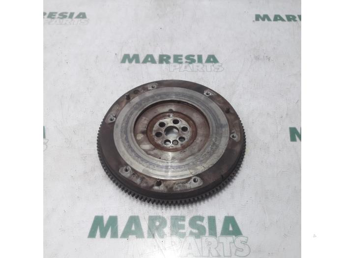 Used Flywheel Fiat Stilo MW (192C) 1.6 16V Price € 50,00 Margin scheme offered by Maresia Parts