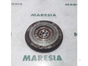 Used Flywheel Fiat Stilo MW (192C) 1.6 16V Price € 50,00 Margin scheme offered by Maresia Parts