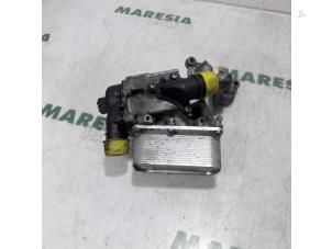 Used Oil filter holder Renault Trafic New (FL) 2.0 dCi 16V 115 Price € 75,00 Margin scheme offered by Maresia Parts
