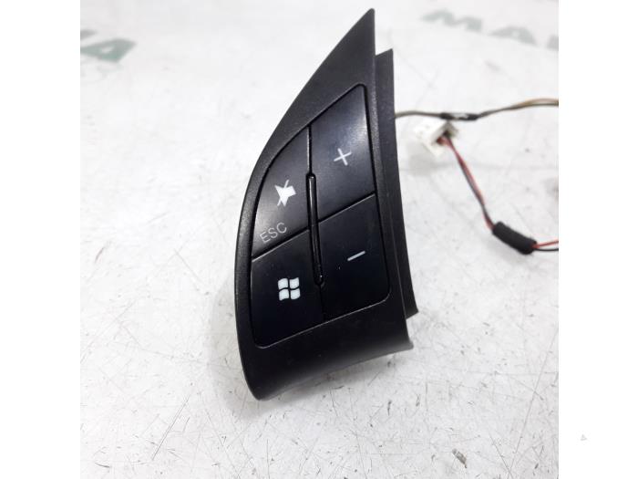 Steering wheel mounted radio control from a Fiat Grande Punto (199) 1.4 16V 2006