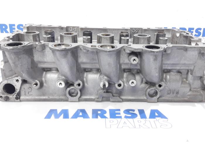 Cylinder head from a Citroën Berlingo Multispace 1.6 Hdi 16V 90 2009