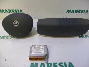 Używane Zestaw + Modul poduszki powietrznej Fiat Doblo (223A/119) 1.6 16V Cena € 210,00 Procedura marży oferowane przez Maresia Parts