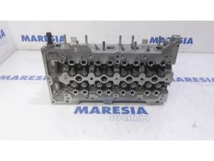 Used Cylinder head Alfa Romeo MiTo (955) 1.3 JTDm 16V Eco Price € 262,50 Margin scheme offered by Maresia Parts