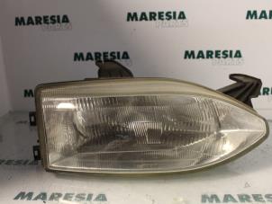 Used Headlight, right Fiat Palio Weekend (178D) 1.6 16V Price € 35,00 Margin scheme offered by Maresia Parts