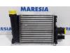 Intercooler from a Renault Clio IV (5R), 2012 / 2021 0.9 Energy TCE 90 12V, Hatchback, 4-dr, Petrol, 898cc, 66kW (90pk), FWD, H4B408; H4BB4, 2015-07 / 2021-08, 5R22; 5R24; 5R32; 5R2R; 5RB2; 5RD2; 5RE2; 5RH2 2016
