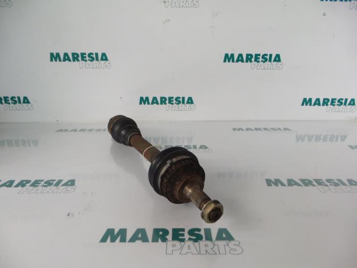 Front drive shaft, left from a Peugeot 306 (7A/C/S) 1.9 D 2001
