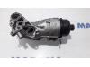 Oil filter holder from a Peugeot Partner (GC/GF/GG/GJ/GK) 1.6 HDI 75 Phase 1 2012