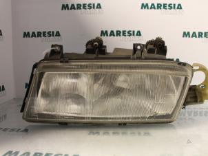 Used Headlight, left Lancia Delta (836) 2.0 i.e. 16V Price € 40,00 Margin scheme offered by Maresia Parts