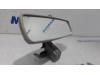 Rear view mirror from a Renault Clio IV Estate/Grandtour (7R) 0.9 Energy TCE 12V 2014