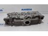 Cylinder head from a Peugeot 5008 I (0A/0E) 1.6 HDiF 16V 2012
