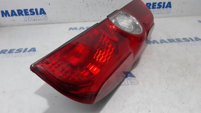 Taillight, left from a Opel Combo 1.4 16V ecoFlex 2013