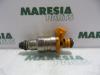 Injector (petrol injection) from a Fiat Palio Weekend (178D) 1.2 MPI Fire 1999