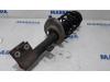 Front shock absorber rod, left from a Peugeot 5008 I (0A/0E) 1.6 THP 16V 2011