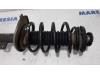 Front shock absorber rod, left from a Peugeot 5008 I (0A/0E) 1.6 THP 16V 2011